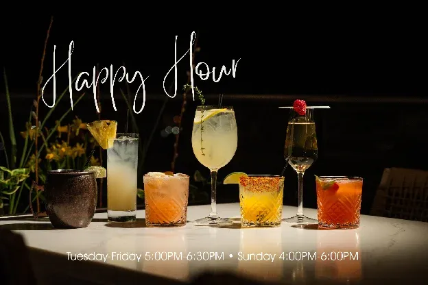 A row of cocktails on the bar with the words "Happy Hour" overlaid.